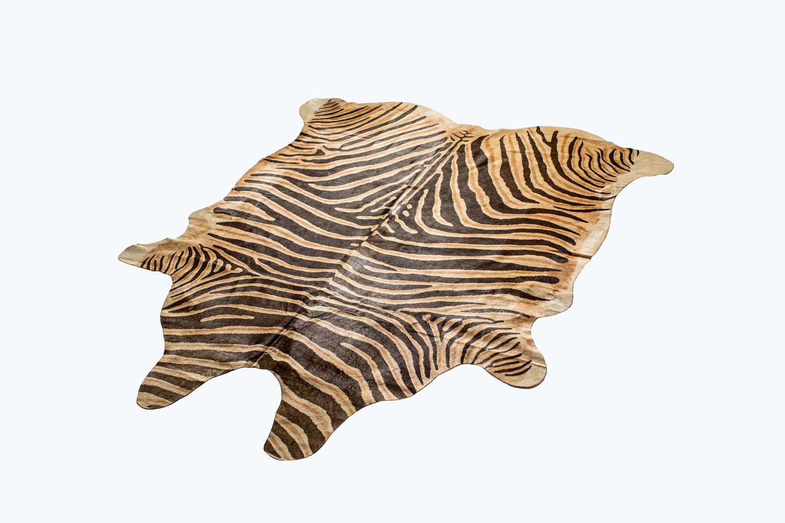 5′ X 7′ Beige and Brown Cowhide Area Rug