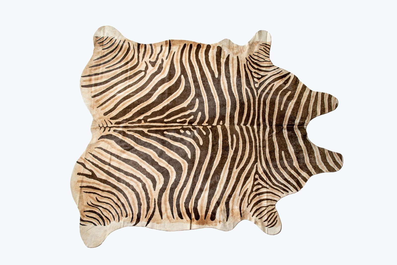 5′ X 7′ Beige and Brown Cowhide Area Rug
