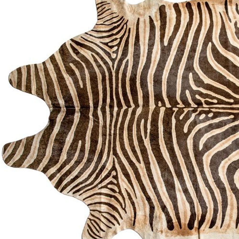 5′ X 7′ Beige and Brown Cowhide Area Rug