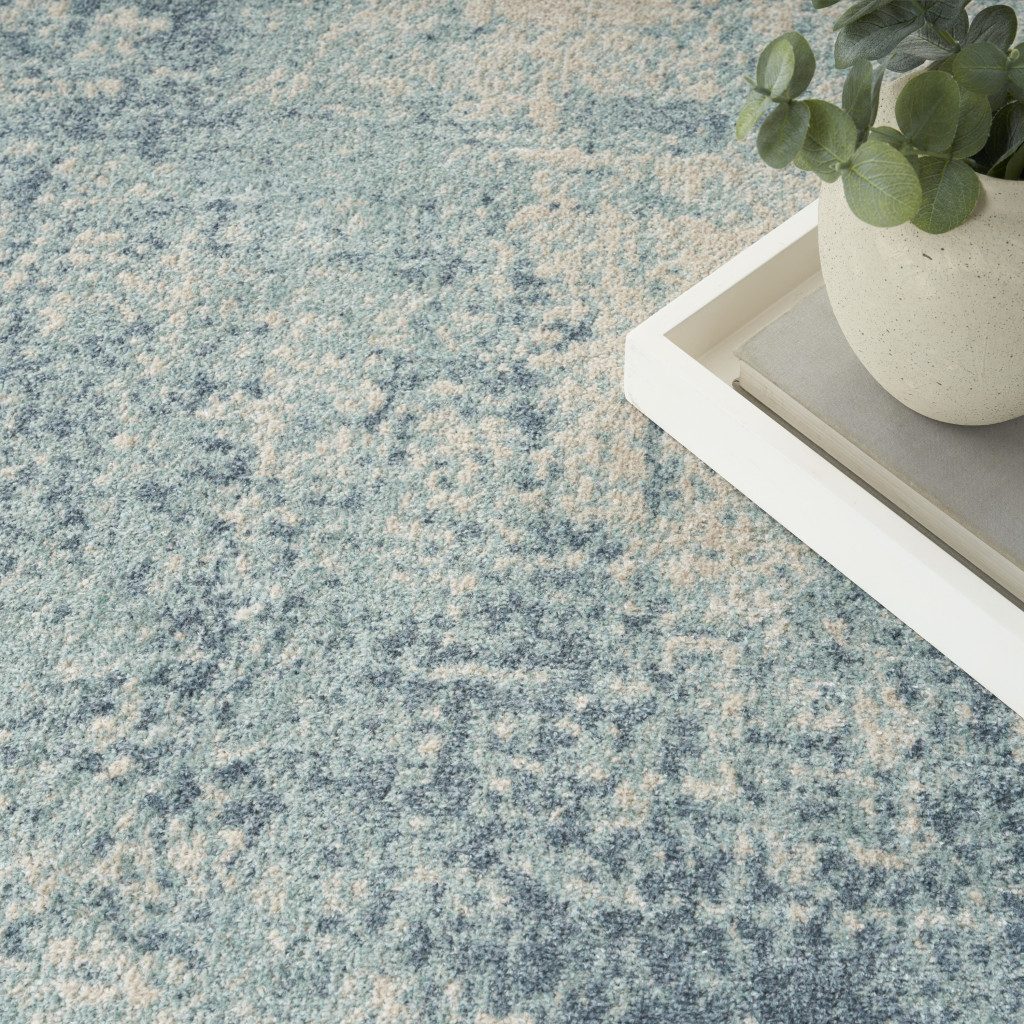 9′ X 12′ Blue and Ivory Abstract Washable Area Rug