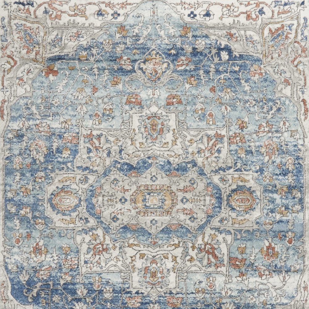 7′ X 10′ Blue and Ivory Distressed Medallion Area Rug