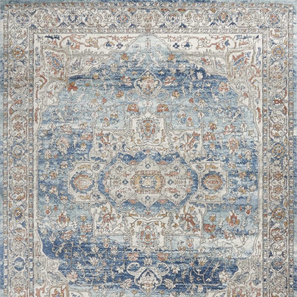 7′ X 10′ Blue and Ivory Distressed Medallion Area Rug