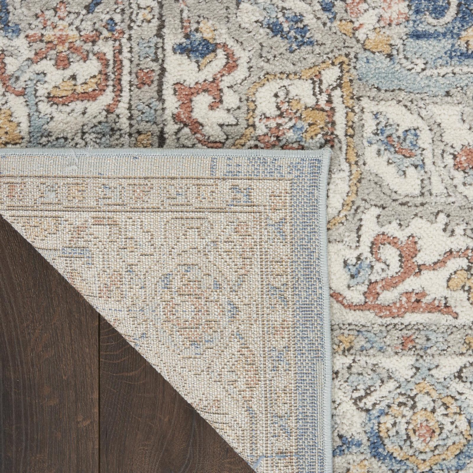 7′ X 10′ Blue and Ivory Distressed Medallion Area Rug