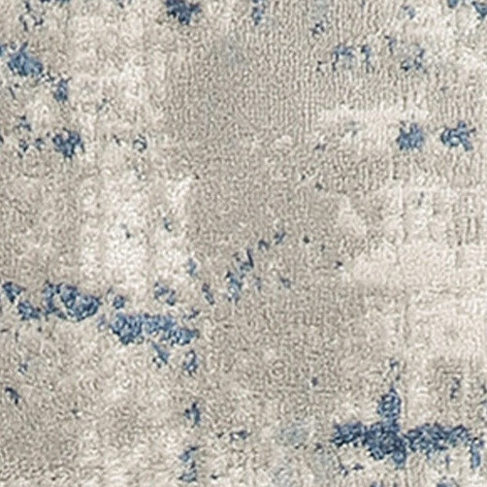 6′ Gray and Ivory Abstract Runner Rug
