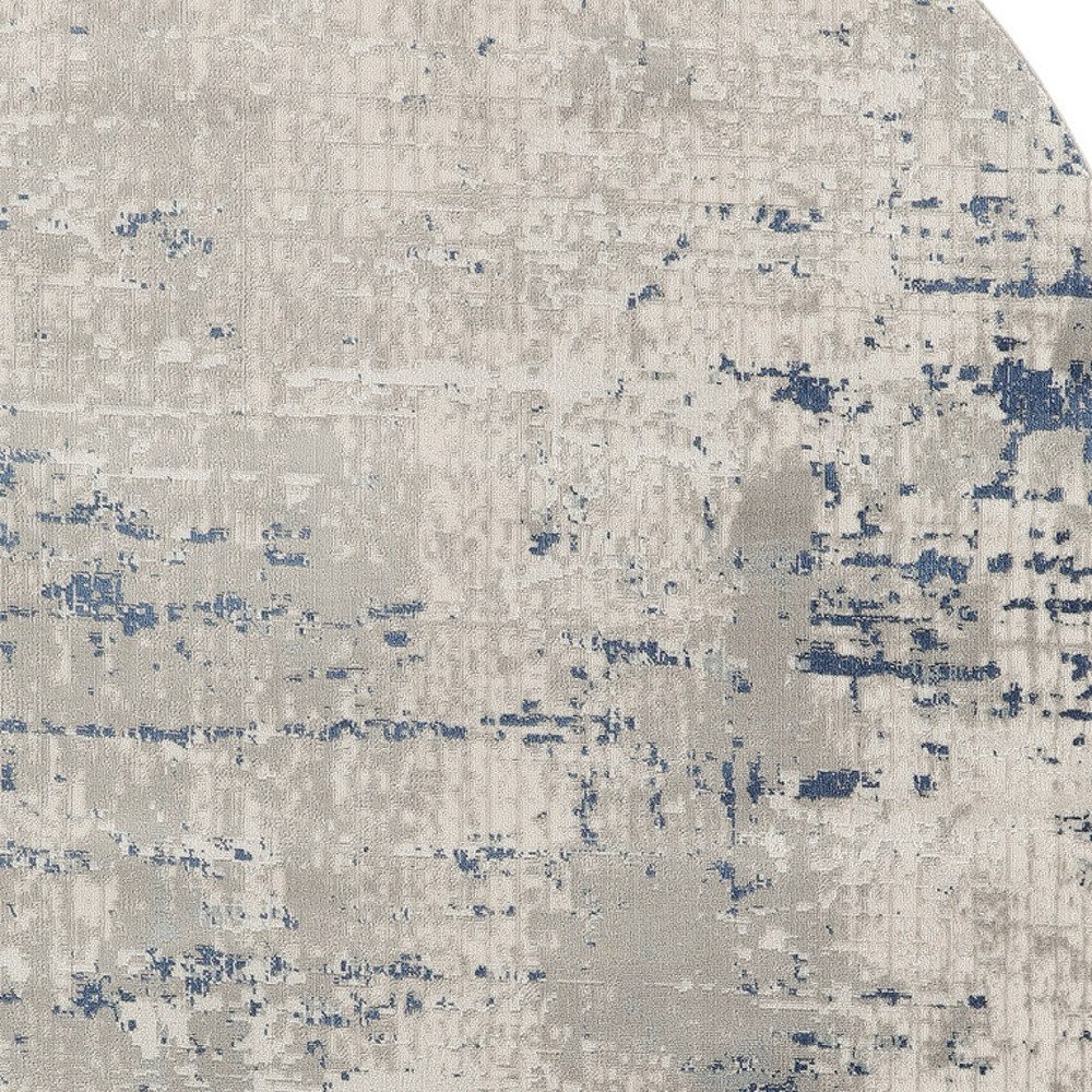 6′ X 9′ Gray and Ivory Abstract Area Rug