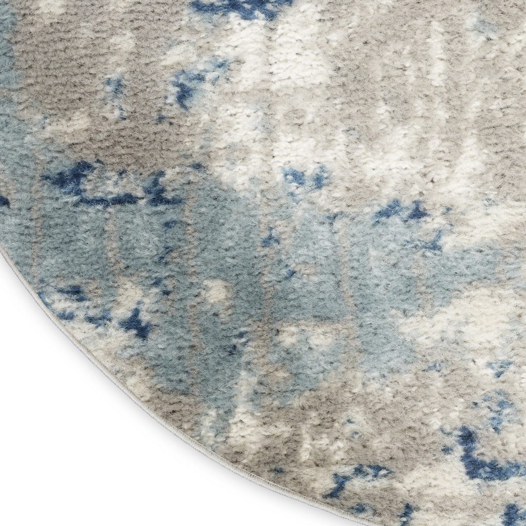 6′ X 9′ Gray and Ivory Abstract Area Rug