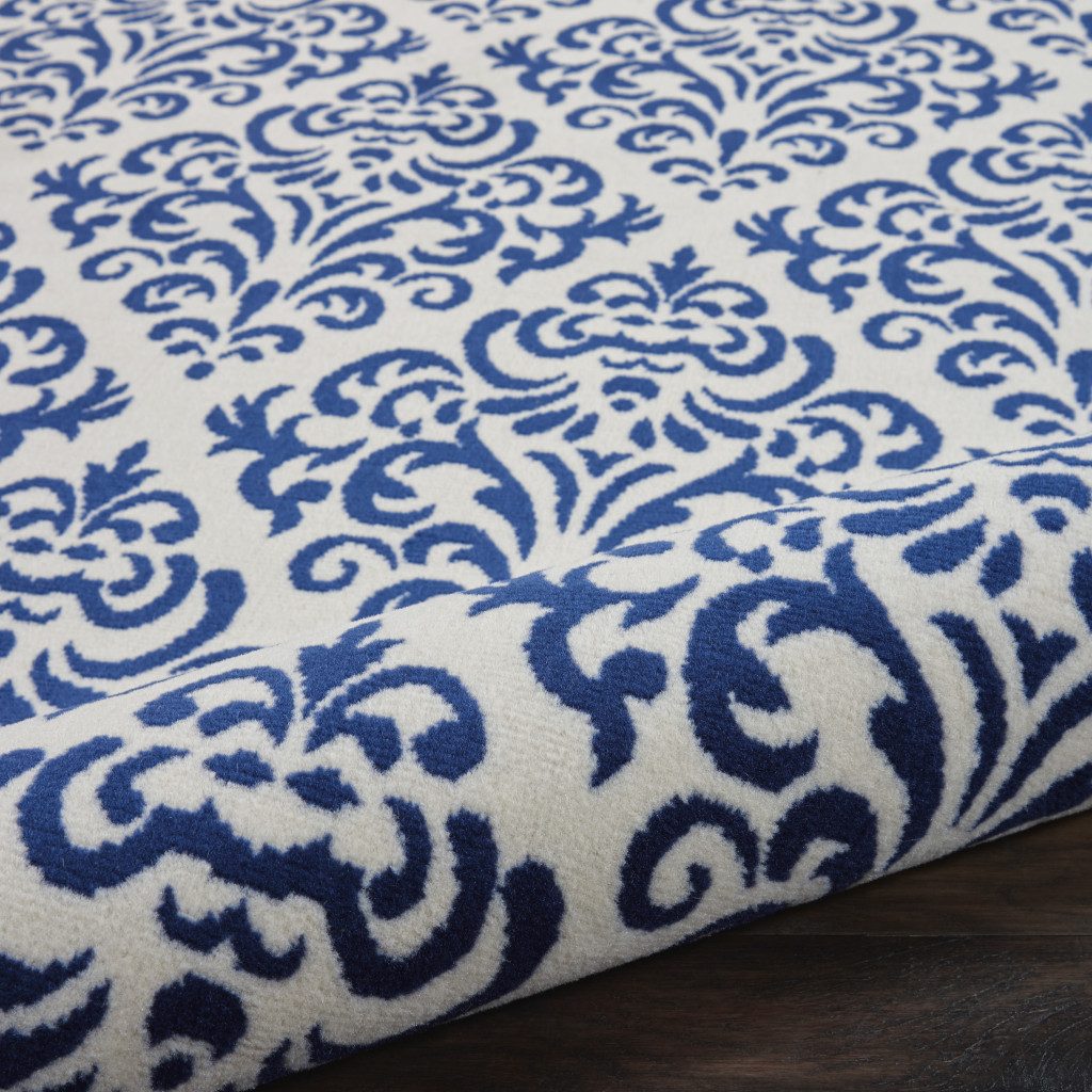 7′ X 10′ Blue and White Damask Area Rug
