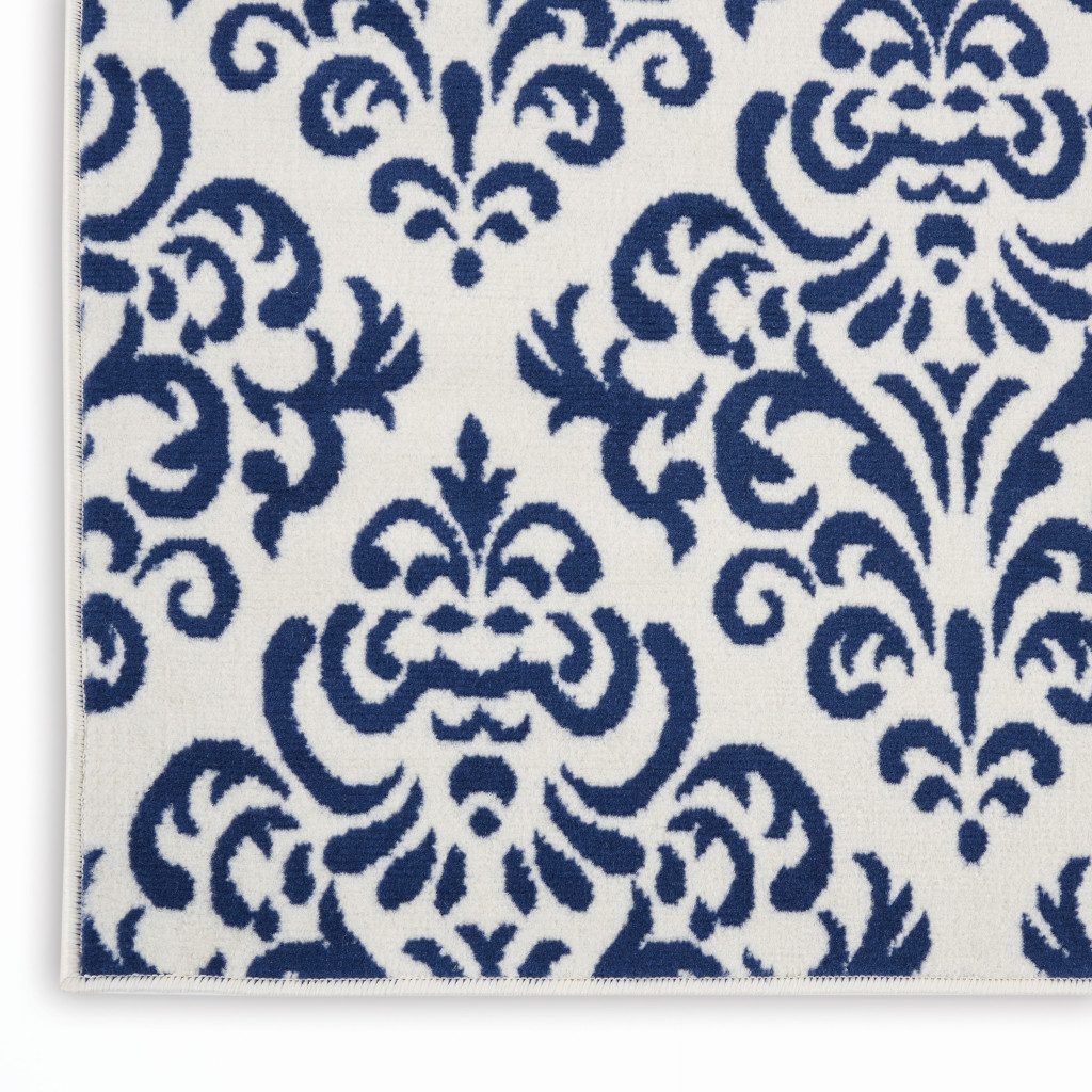 7′ X 10′ Blue and White Damask Area Rug