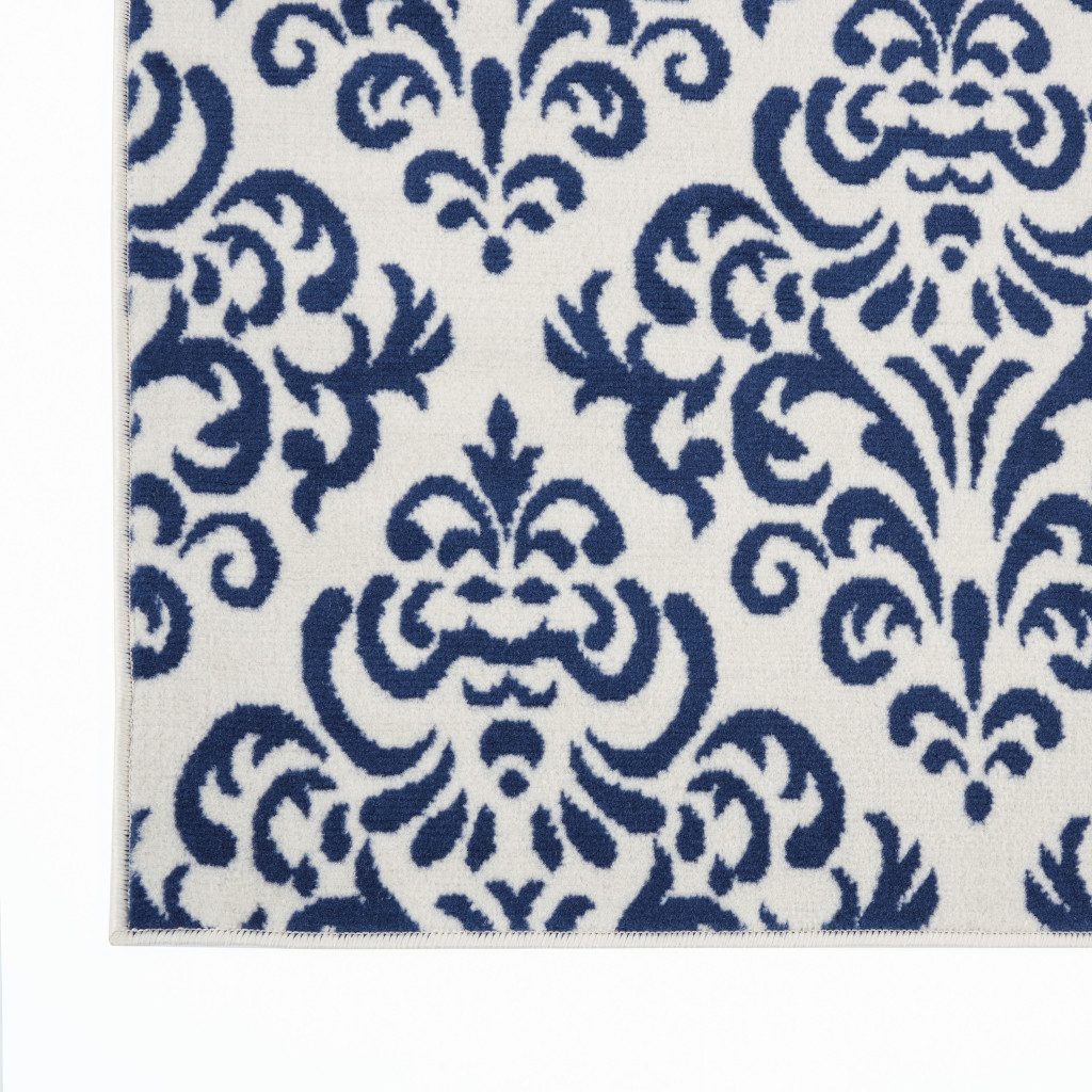 6′ X 9′ Blue and White Damask Area Rug