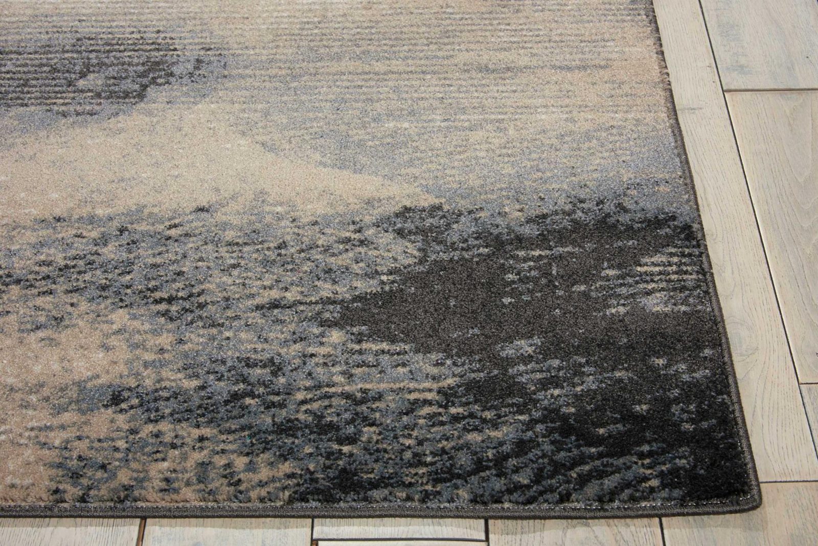 5′ X 7′ Gray Black and Beige Abstract Area Rug