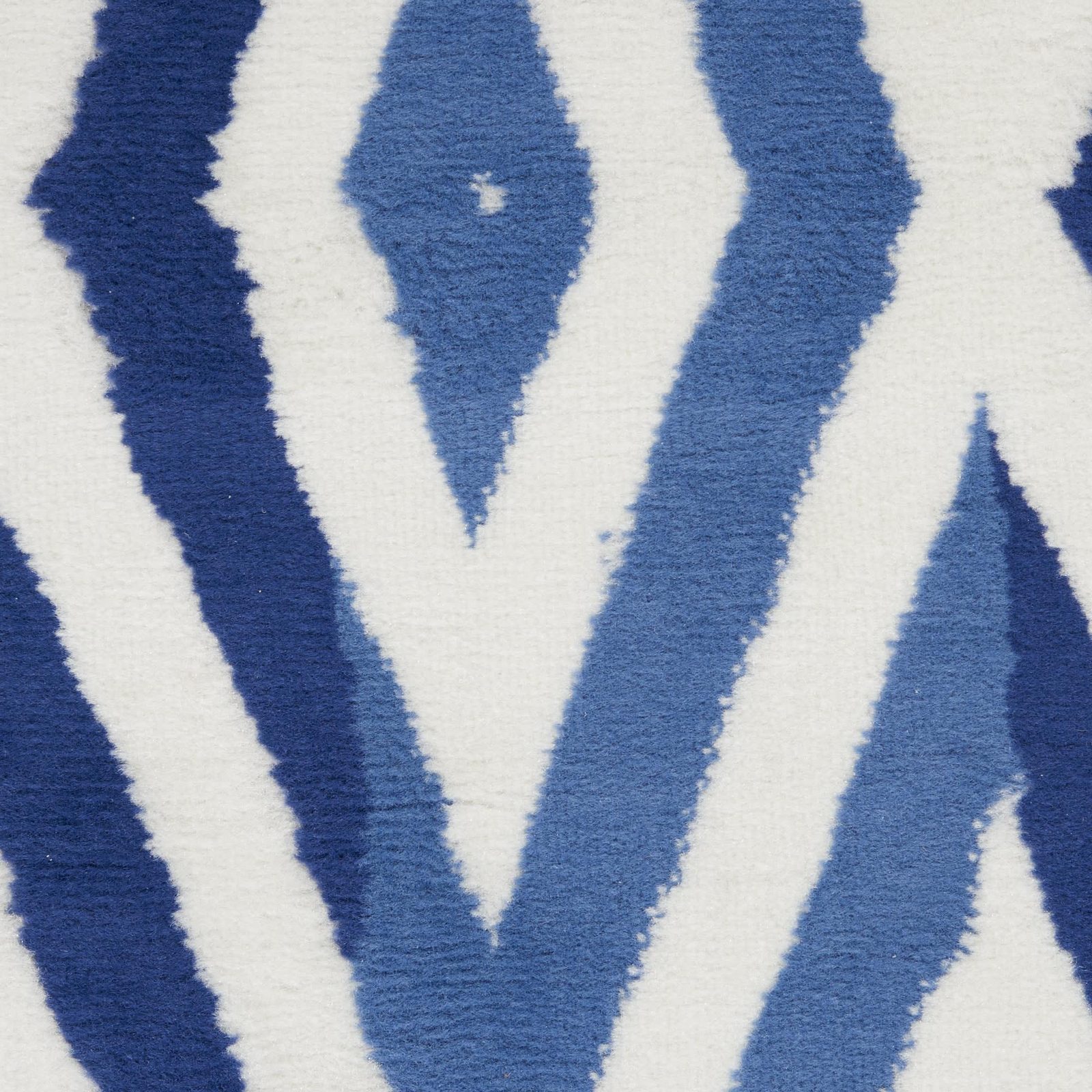 7′ X 10′ Ivory and Blue Geometric Distressed Area Rug