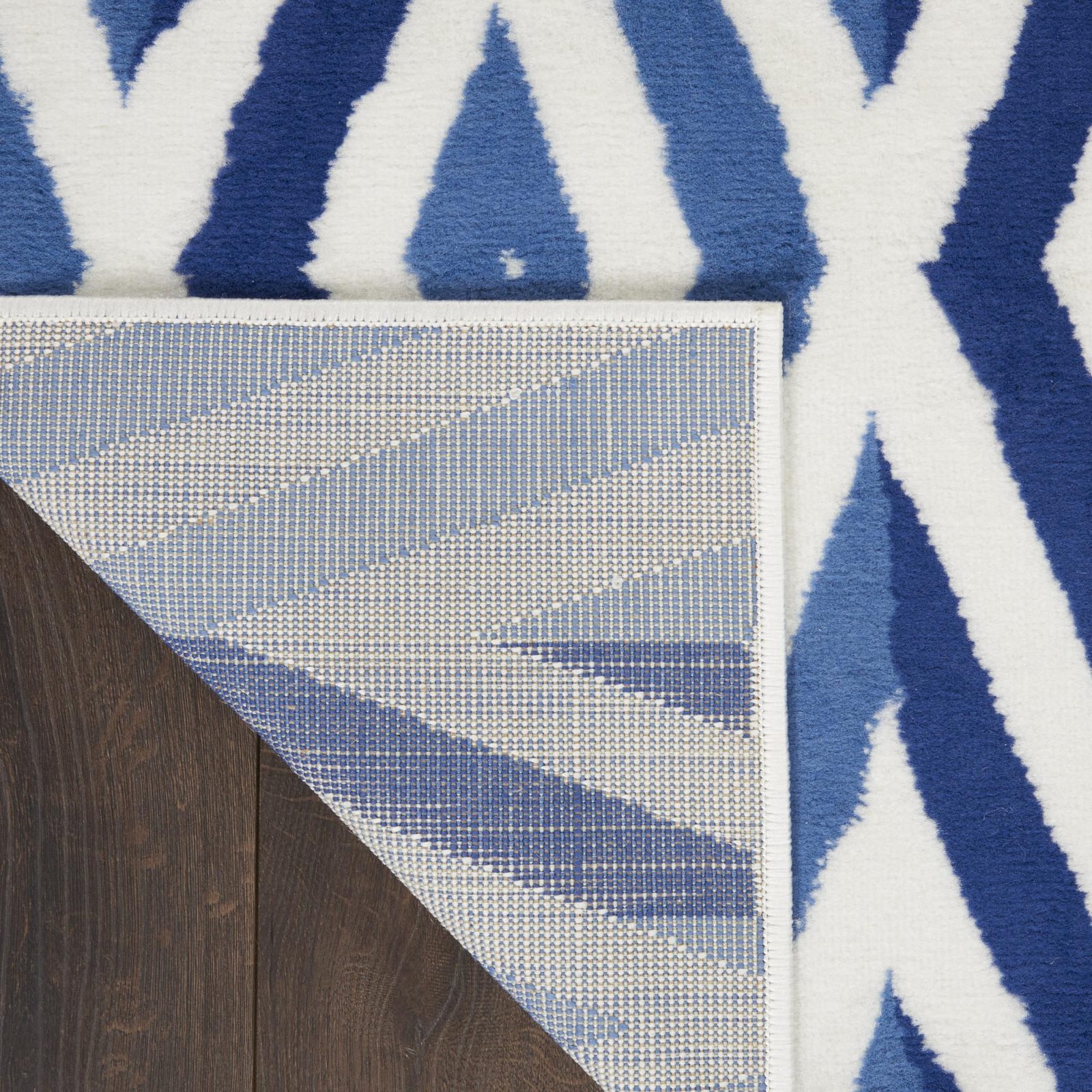 8′ X 10′ Ivory and Blue Geometric Distressed Area Rug