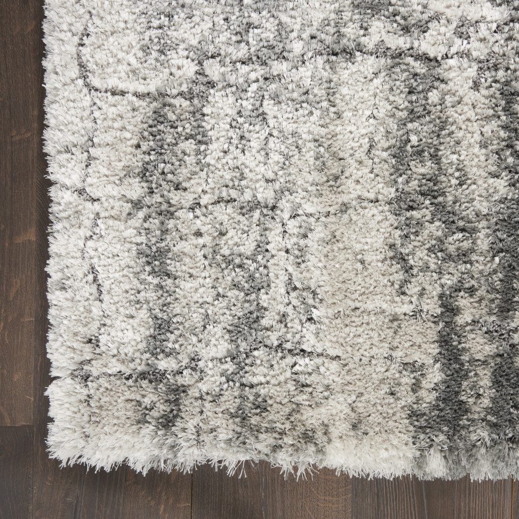 5′ X 7′ Charcoal and Ivory Abstract Shag Area Rug