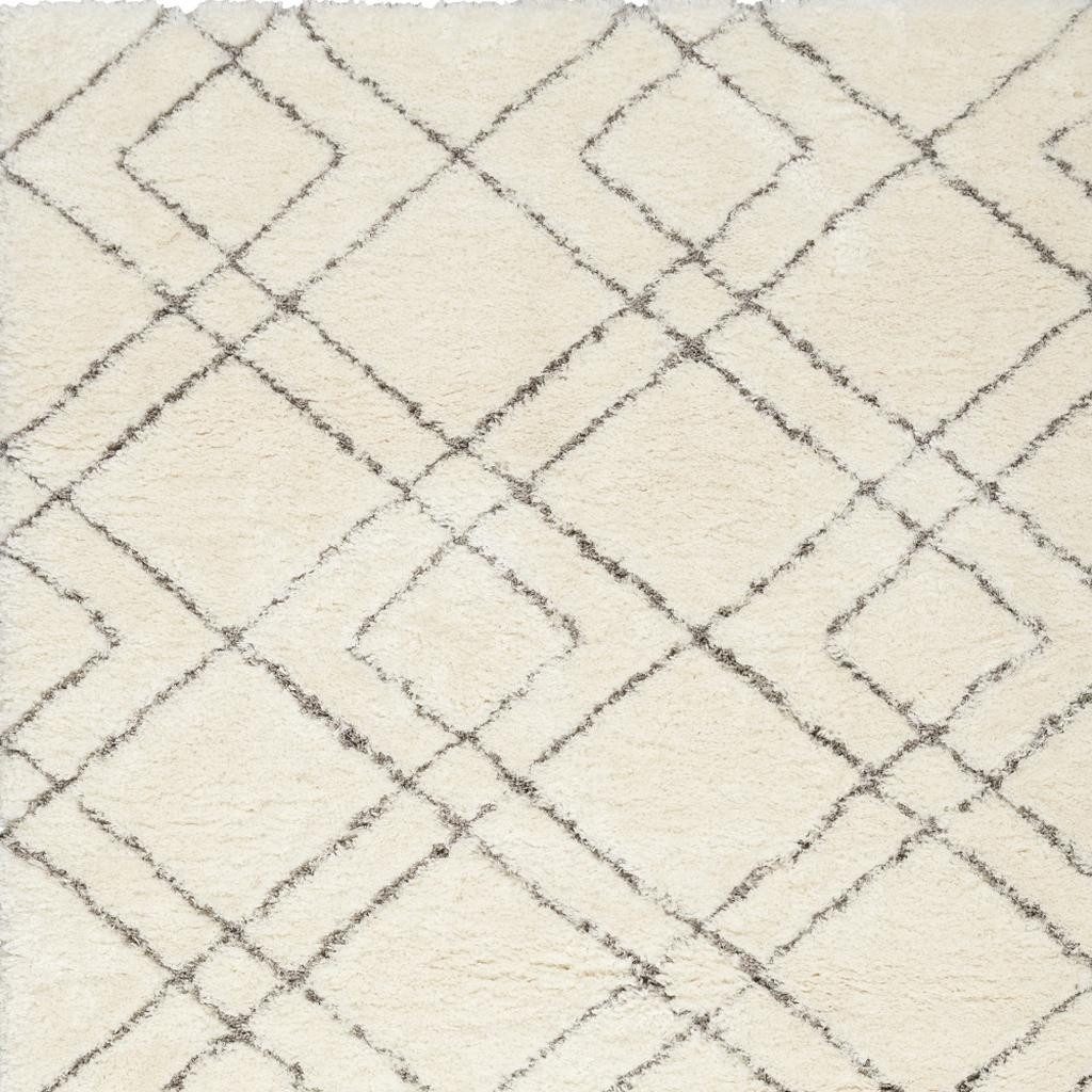 5′ X 7′ Ivory and Gray Geometric Shag Area Rug