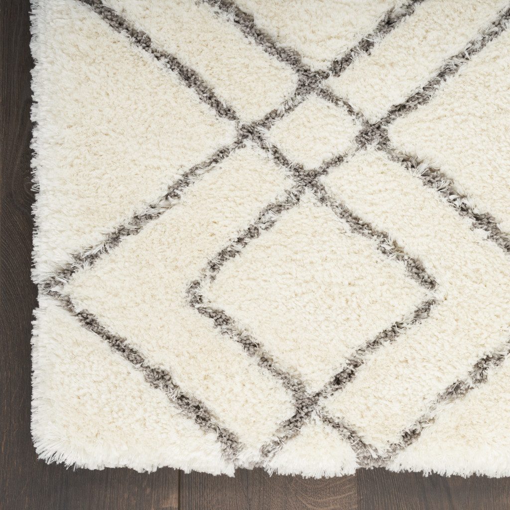 5′ X 7′ Ivory and Gray Geometric Shag Area Rug
