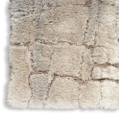 5′ X 7′ Beige and Ivory Abstract Shag Area Rug