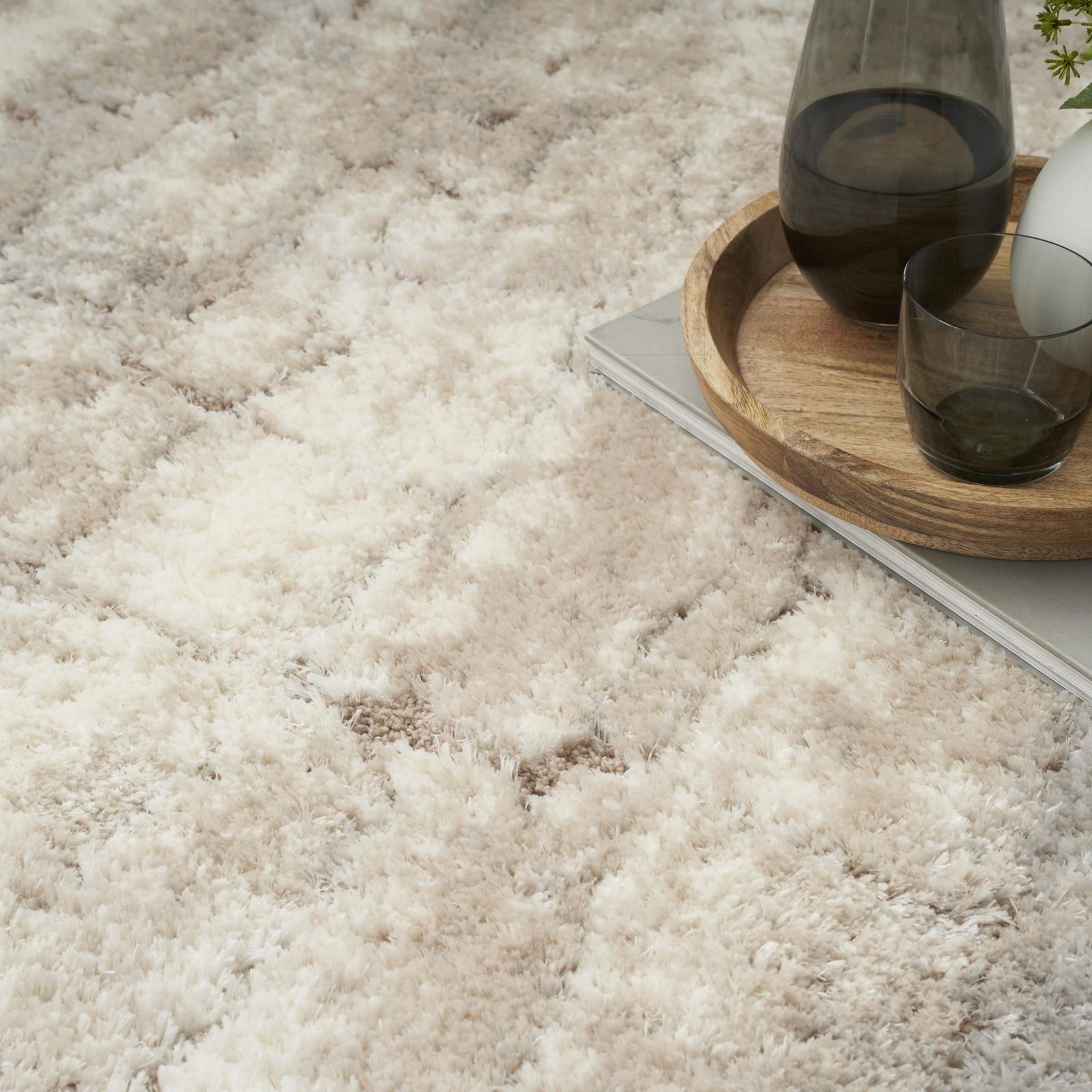 5′ X 7′ Beige and Ivory Abstract Shag Area Rug