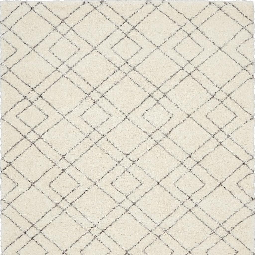 7′ X 9′ Ivory and Gray Geometric Shag Area Rug