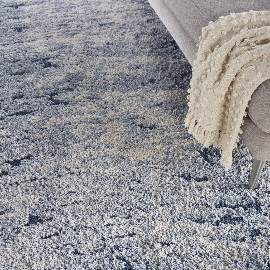 7′ X 9′ Navy Blue Beige Abstract Shag Area Rug