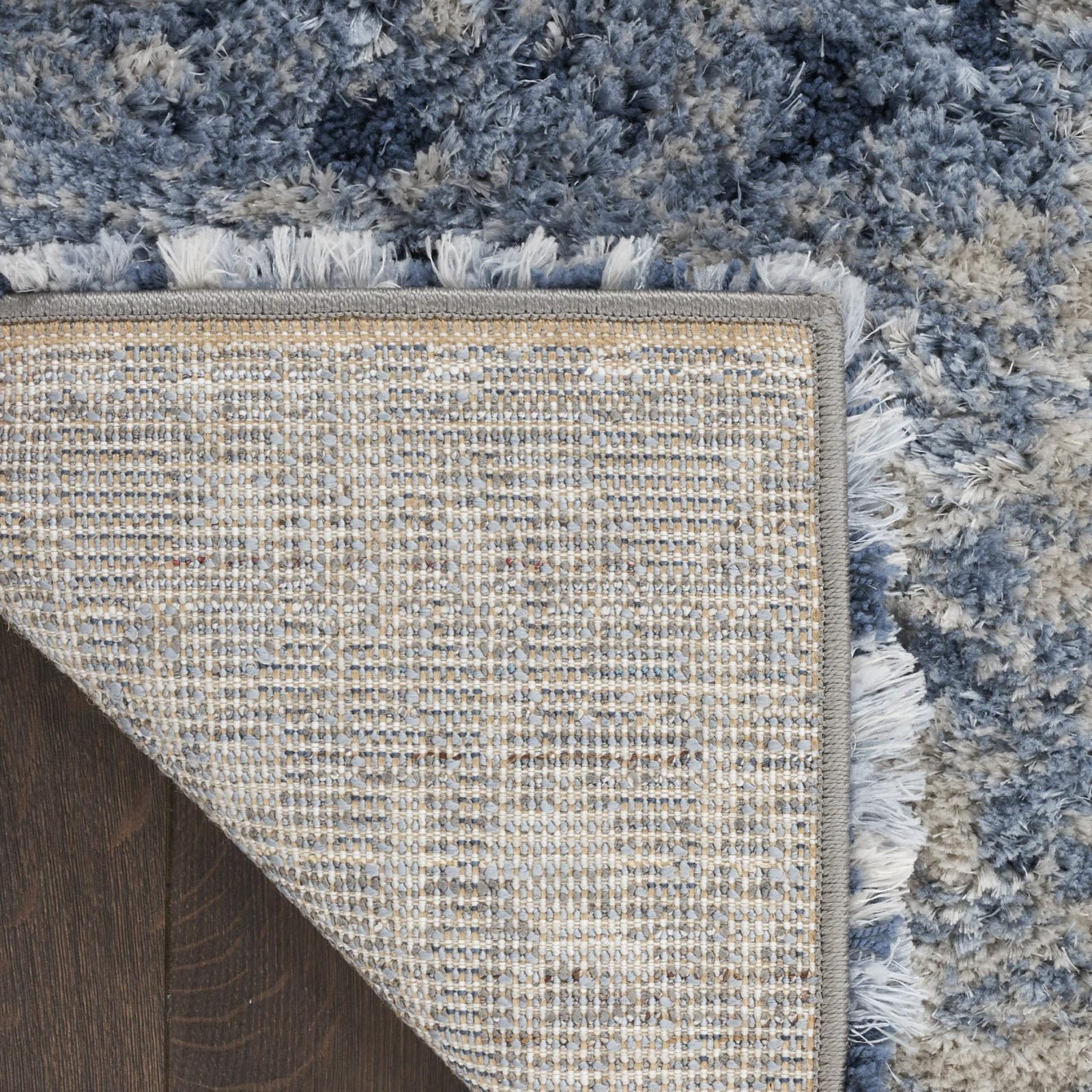 7′ X 9′ Navy Blue Beige Abstract Shag Area Rug