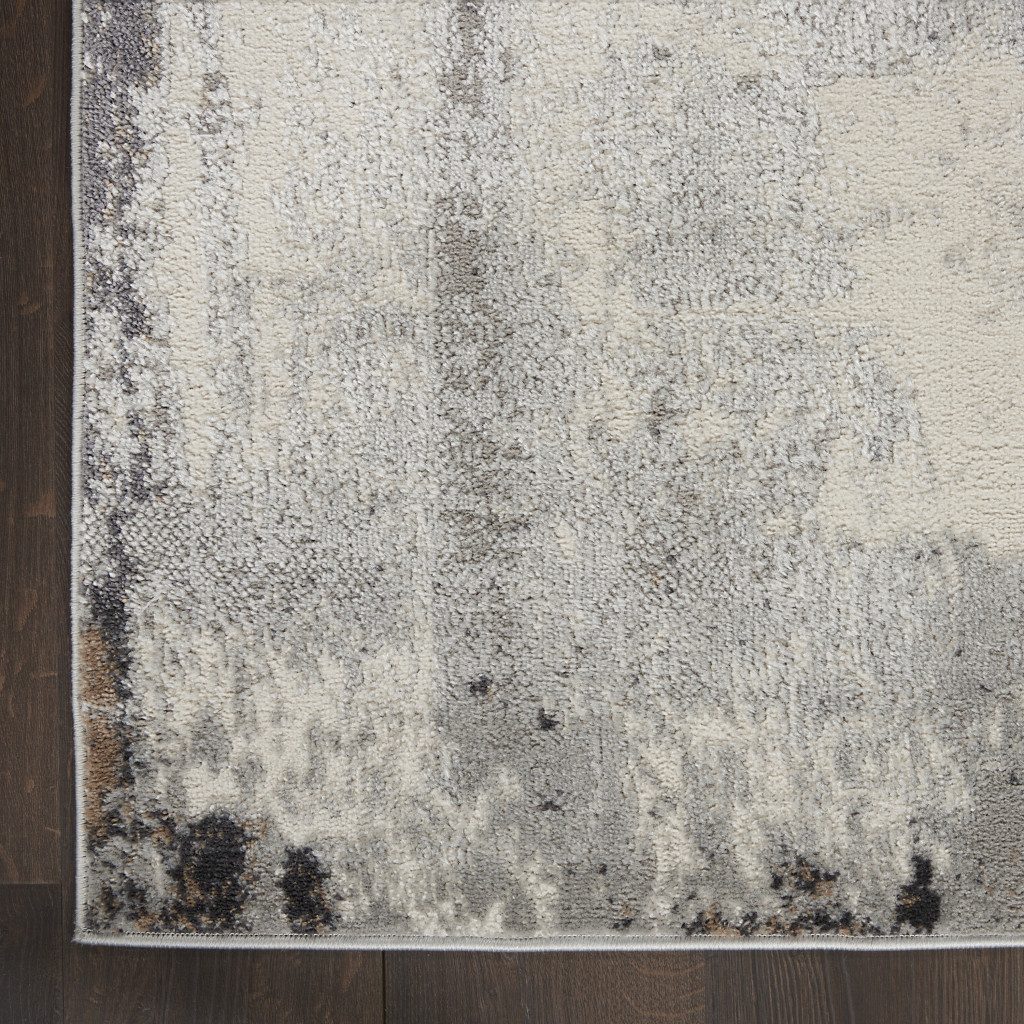 9′ X 12′ Ivory Black and Gray Abstract Area Rug