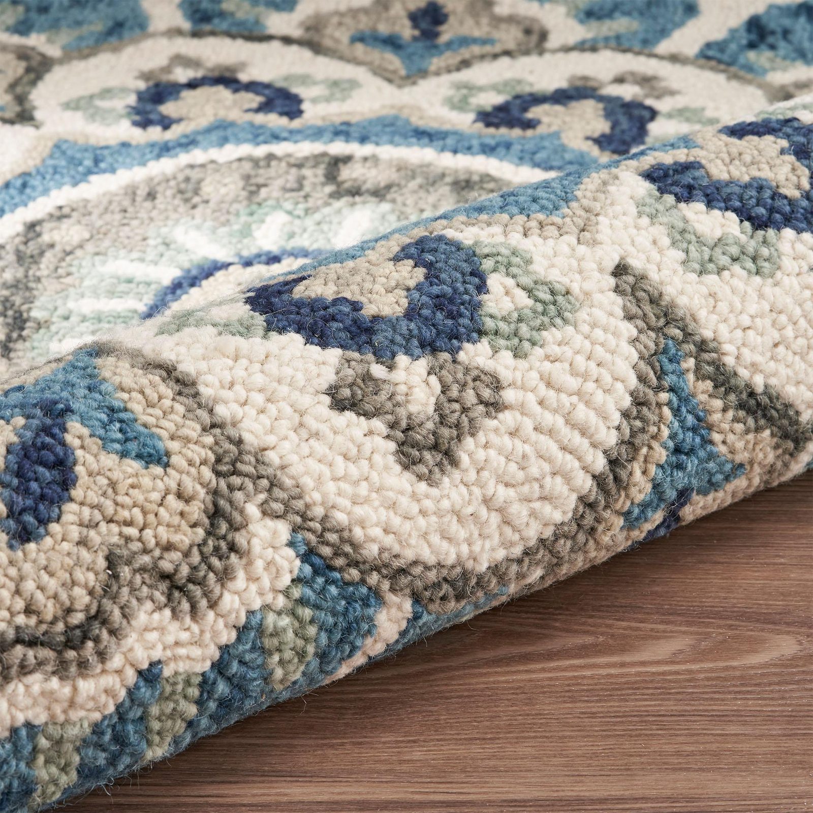 5′ Blue and Ivory Floral Hand Tufted Wool Round Rug