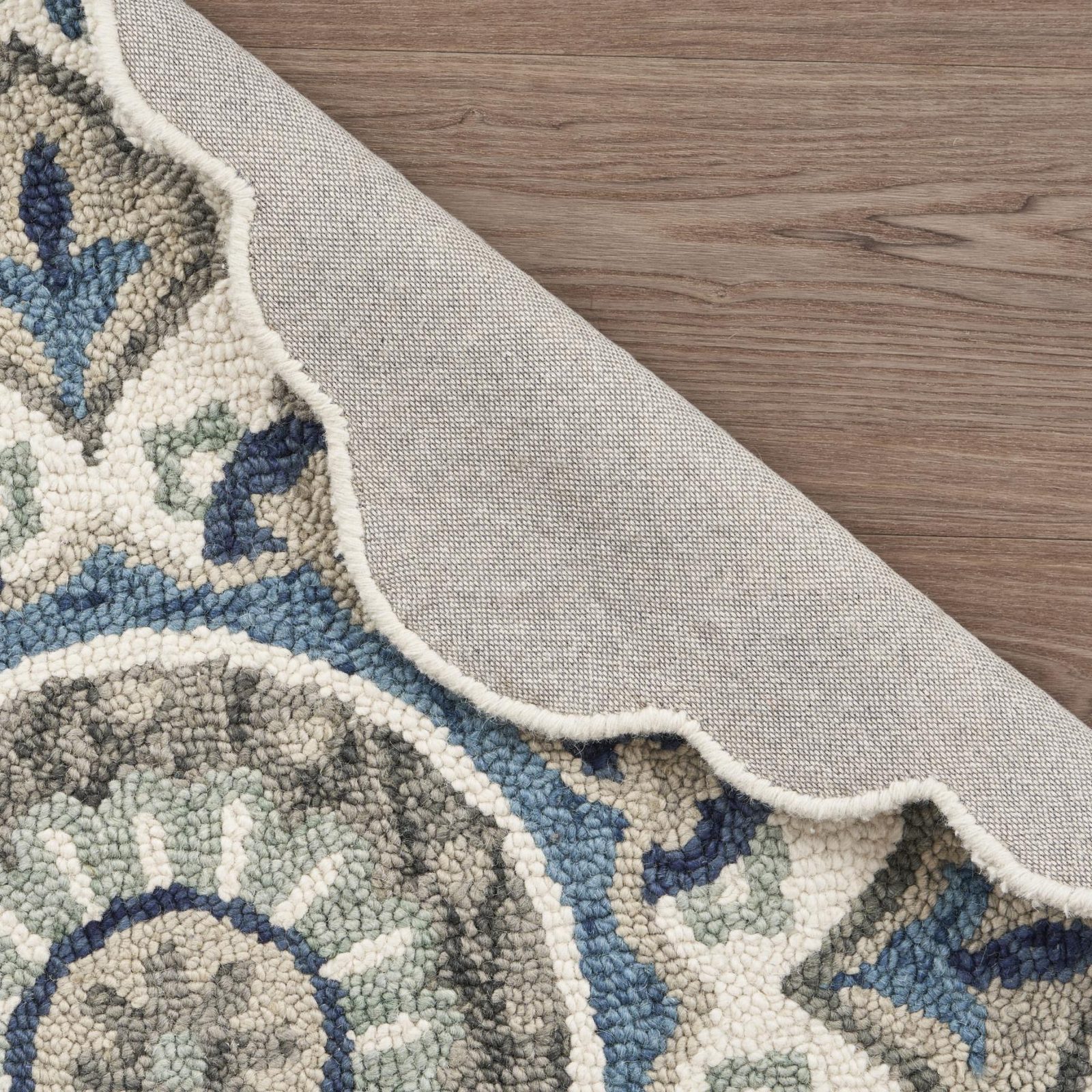 5′ Blue and Ivory Floral Hand Tufted Wool Round Rug