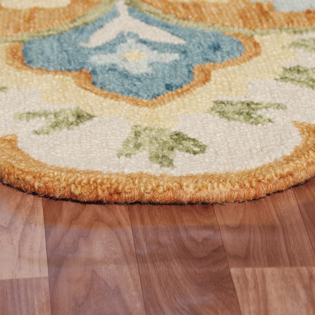 6′ Orange and Blue Round Wool Floral Hand Tufted Rug