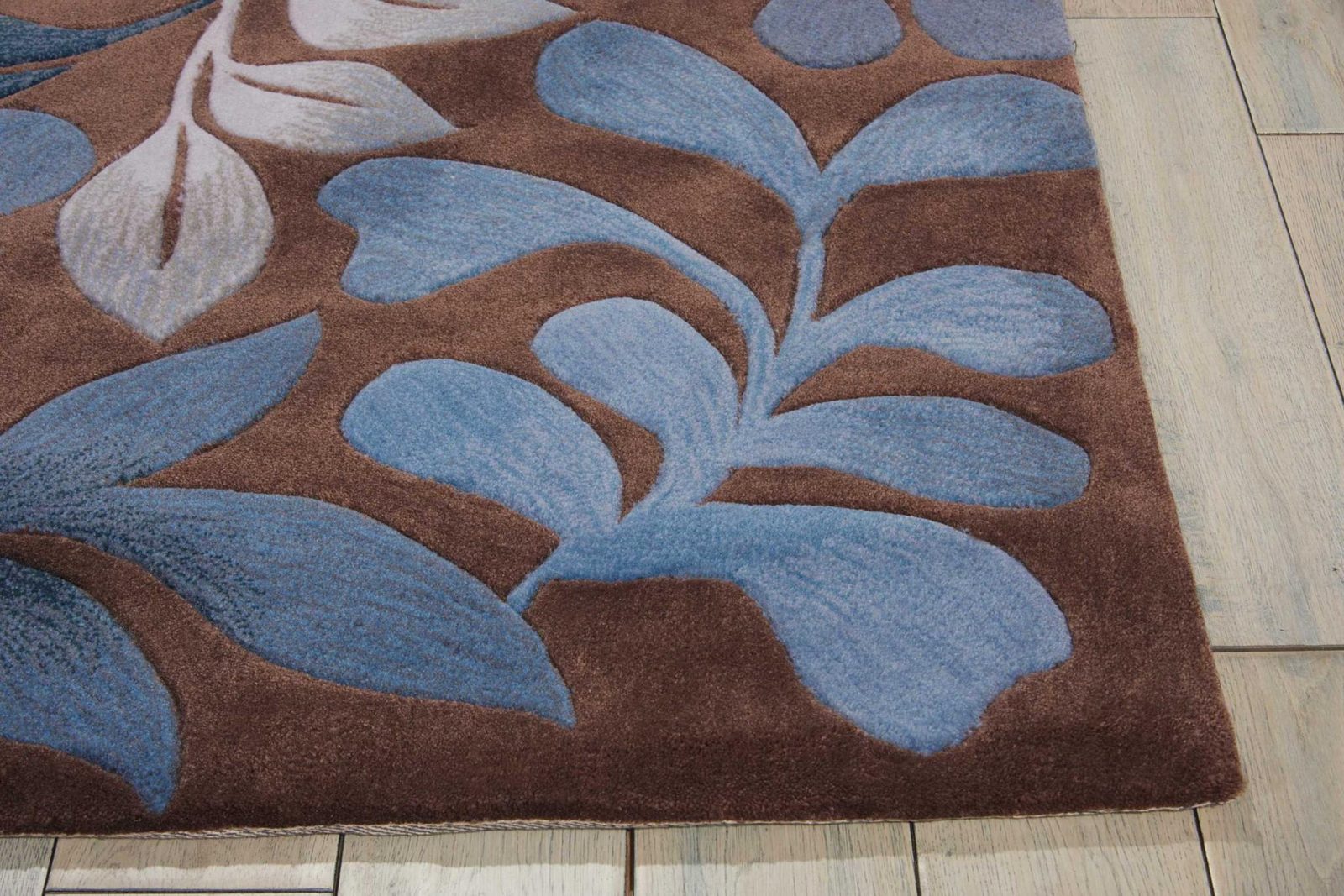 7′ X 9′ Blue and Brown Botanical Leaves Area Rug