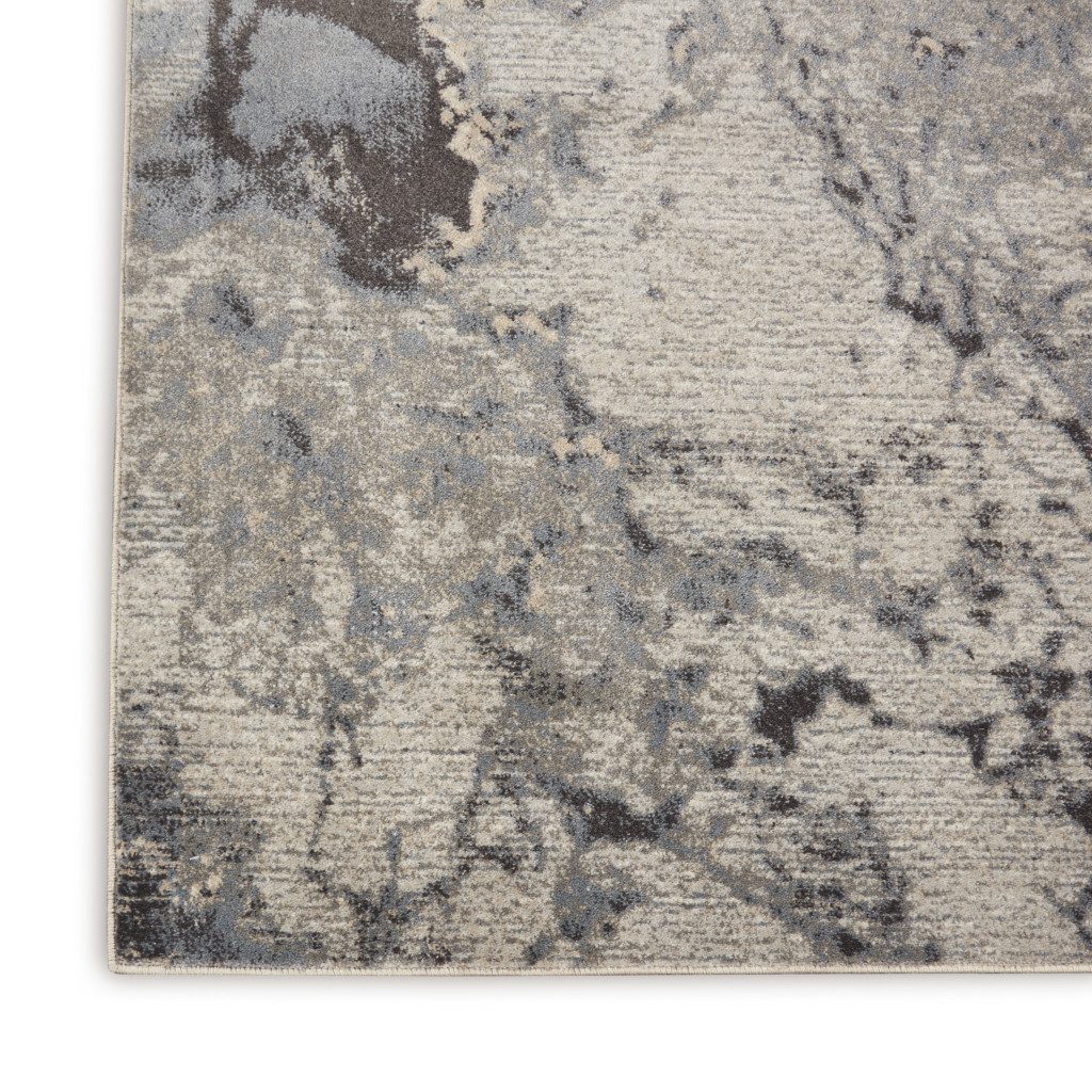 4′ X 6′ Gray Blue and Ivory Abstract Area Rug