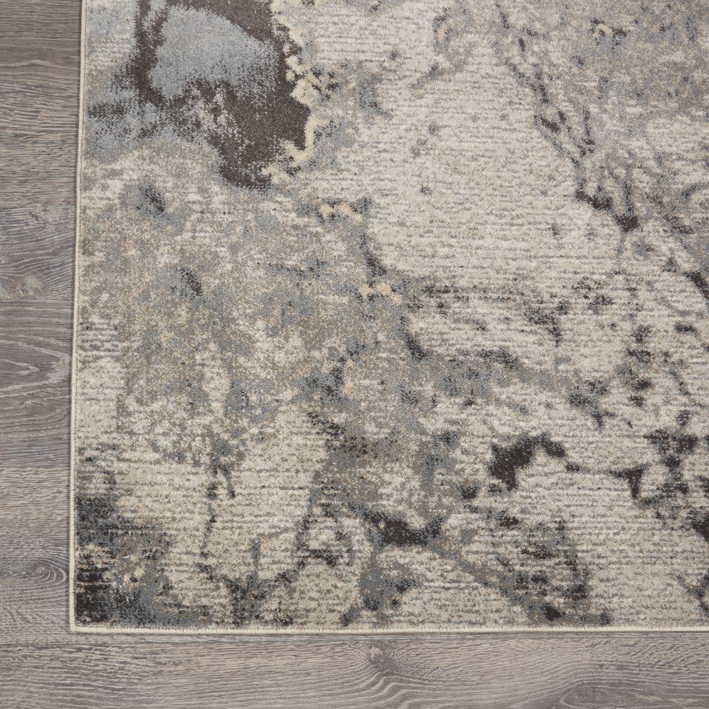 4′ X 6′ Gray Blue and Ivory Abstract Area Rug
