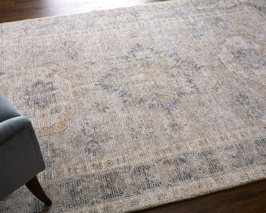 4′ X 6′ Tan and Gray Distressed Oriental Area Rug