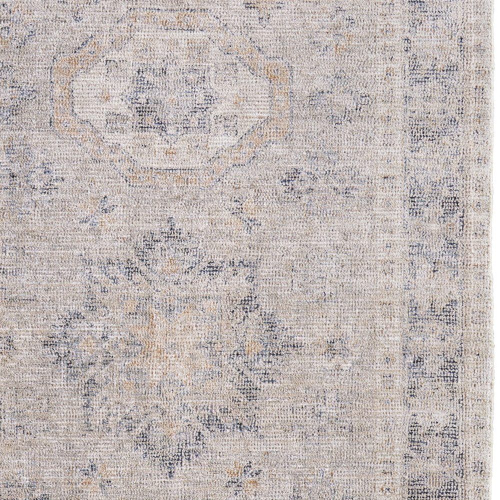 5′ X 8′ Tan and Gray Distressed Oriental Area Rug