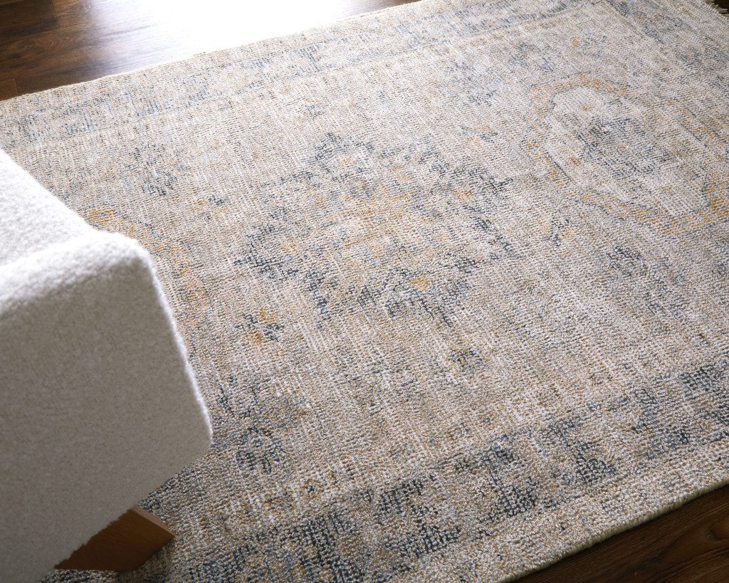 8′ X 10′ Tan and Gray Distressed Oriental Area Rug