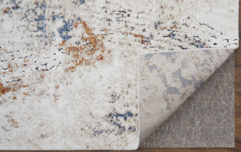 5′ X 8′ Ivory Blue and Brown Abstract Area Rug