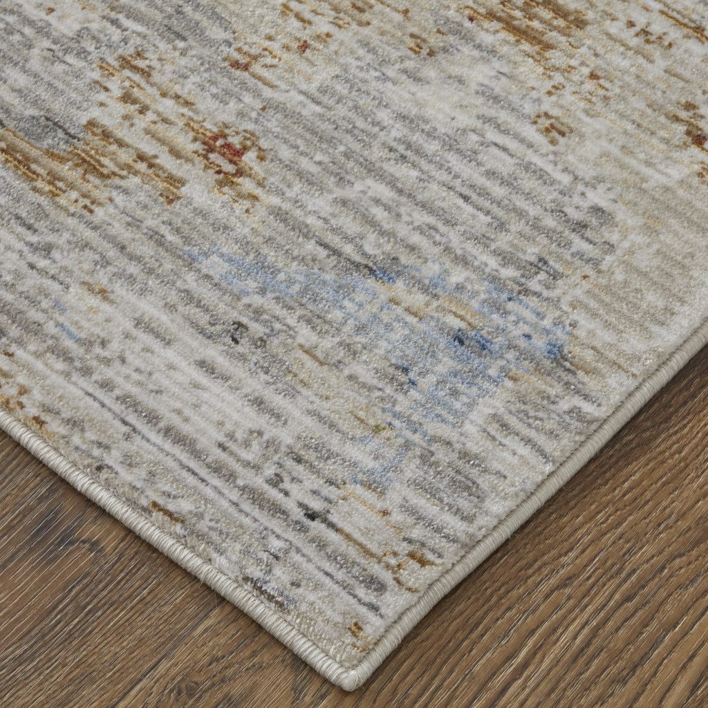 9′ X 13′ Red Blue and Ivory Abstract Area Rug