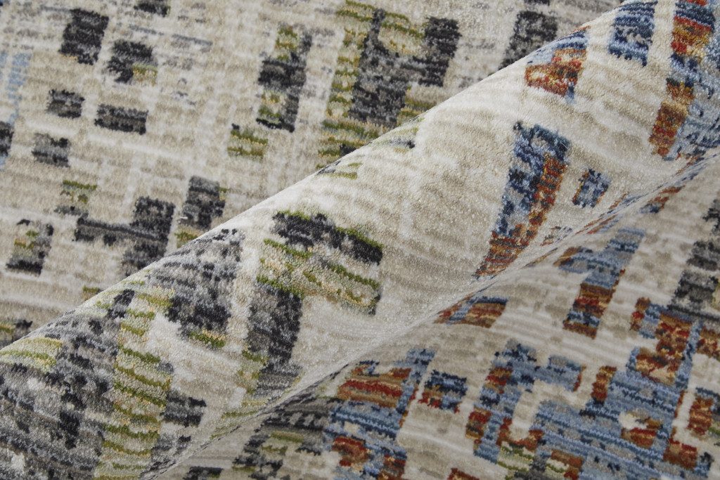 7′ X 10′ Ivory Green and Blue Abstract Area Rug