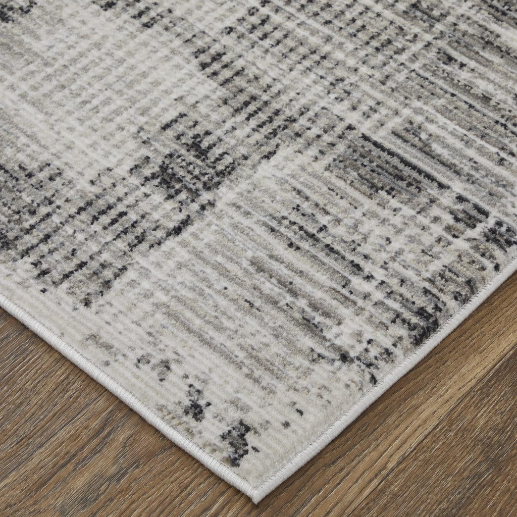 9′ X 13′ Gray and Ivory Abstract Area Rug