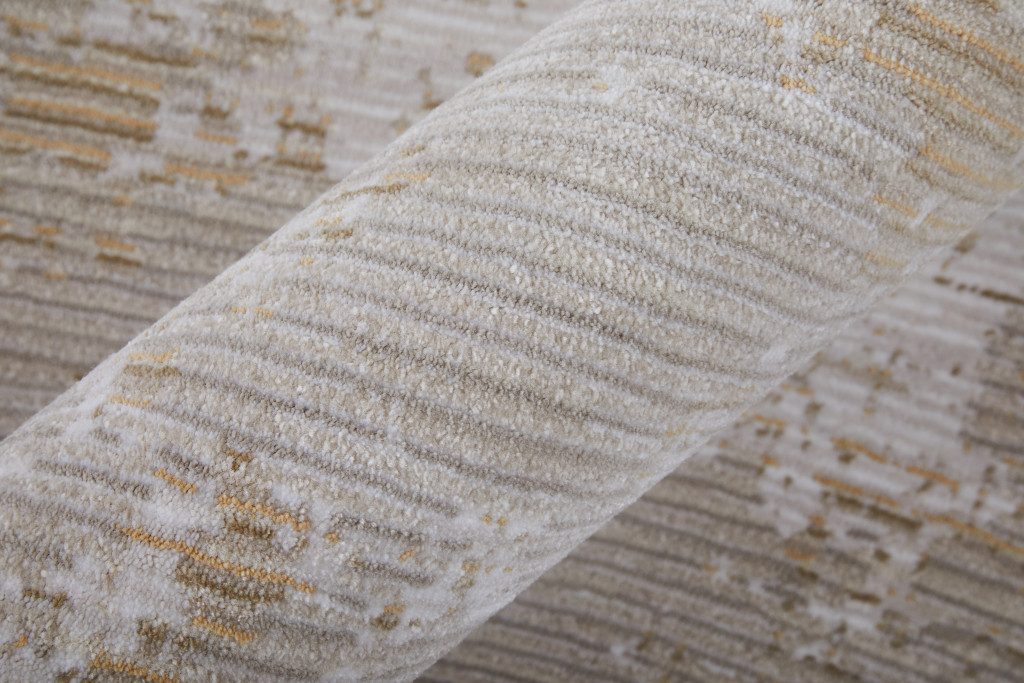 9′ X 13′ Gray Brown and Ivory Abstract Area Rug