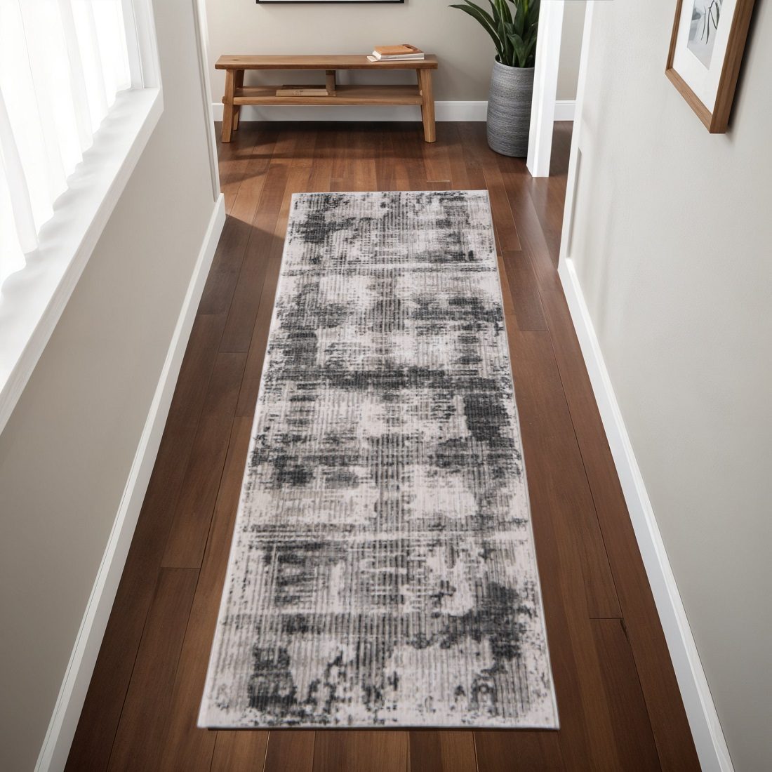 8′ Gray and Ivory Abstract Runner Rug